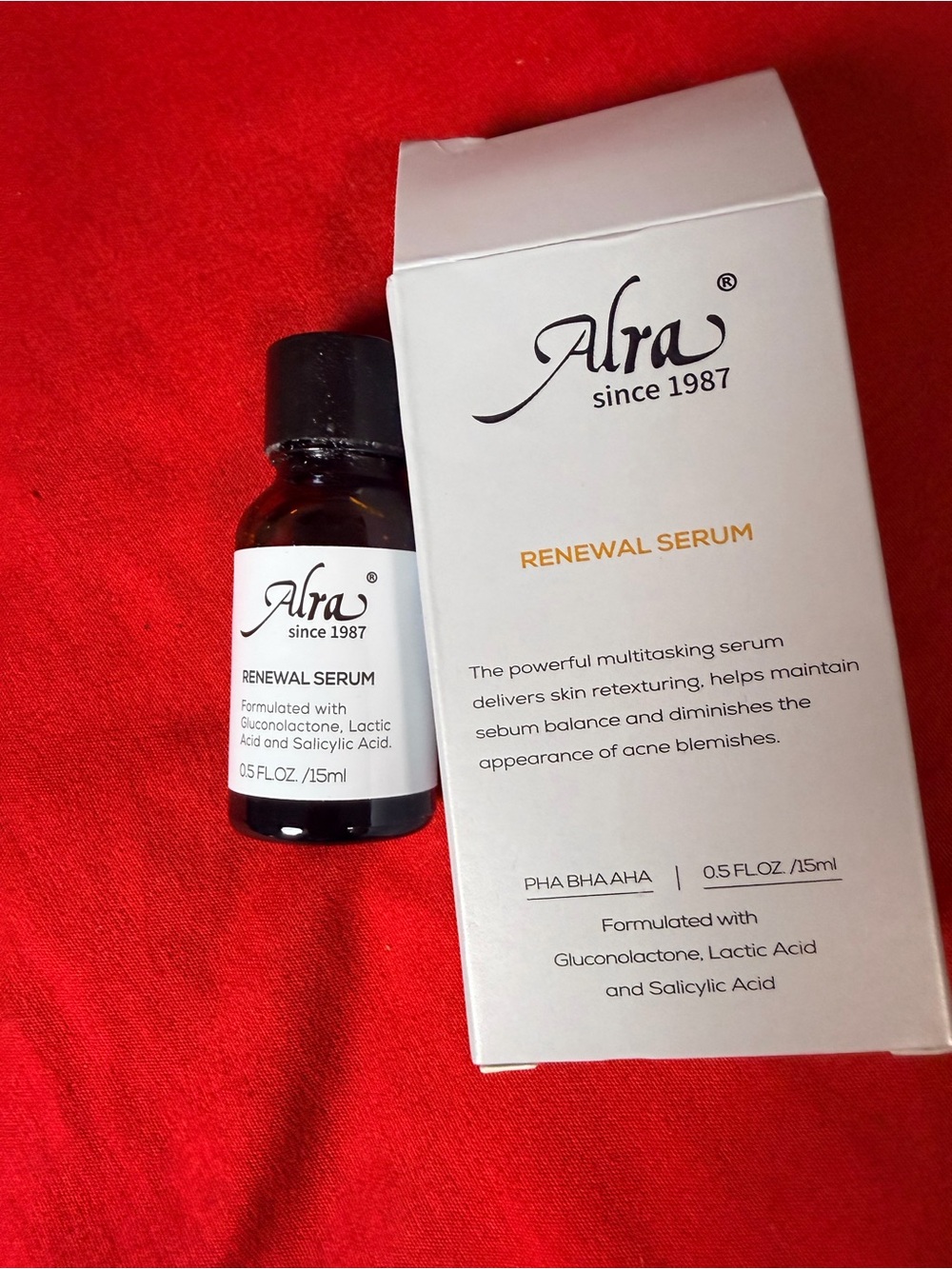 Ara Renewal Serum — White & Black Bottling on Red